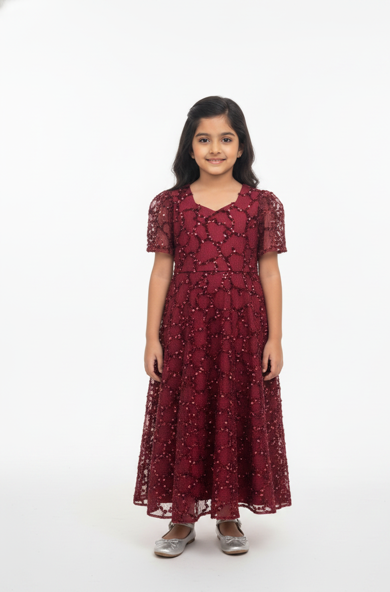 maxi dress with intricate embellishments.