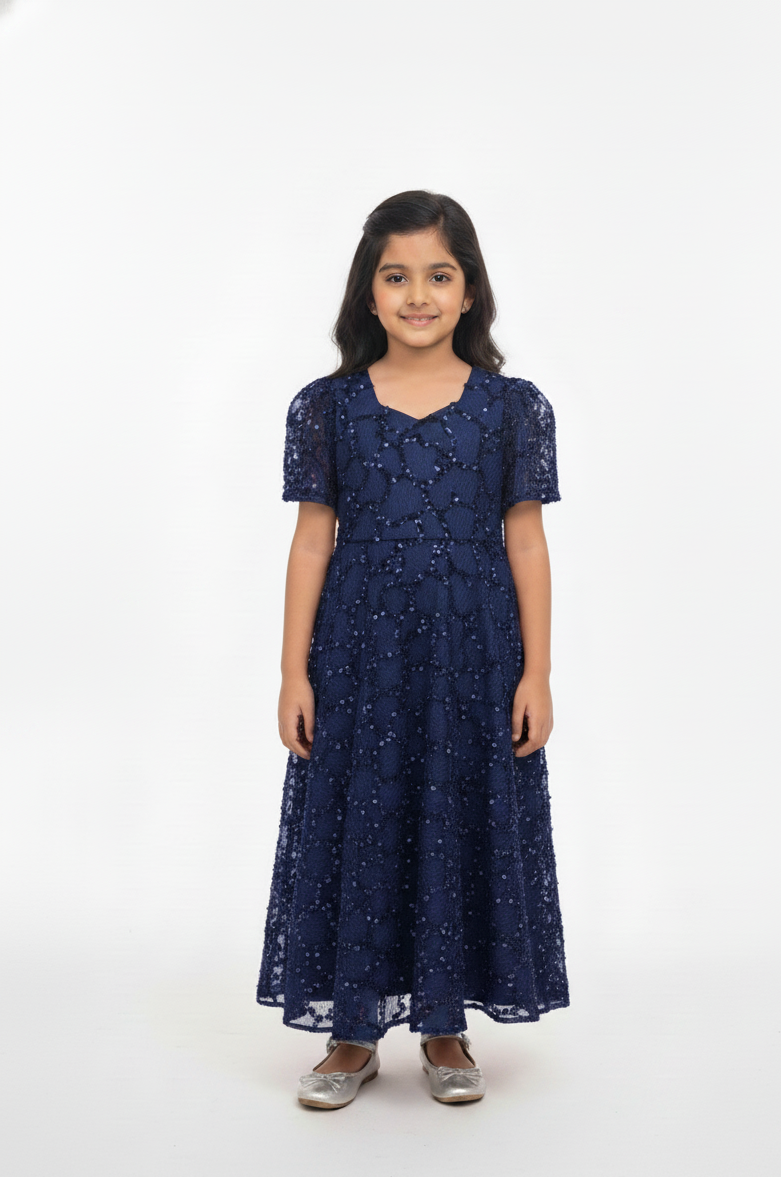 maxi dress with intricate embellishments.